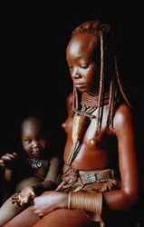 Himba - crédits : Ted Wood/ Stone/ Getty Images
