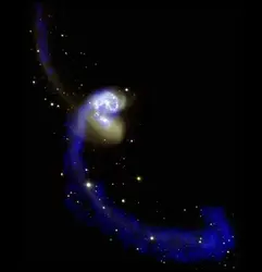 Interaction entre deux galaxies vue dans le spectre de l’hydrogène neutre - crédits : NRAO/ AUI ; John Hibbard