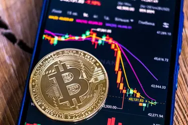 Vente et échange de cryptoactifs bitcoins - crédits : Andrey Gorgots/ Shutterstock.com